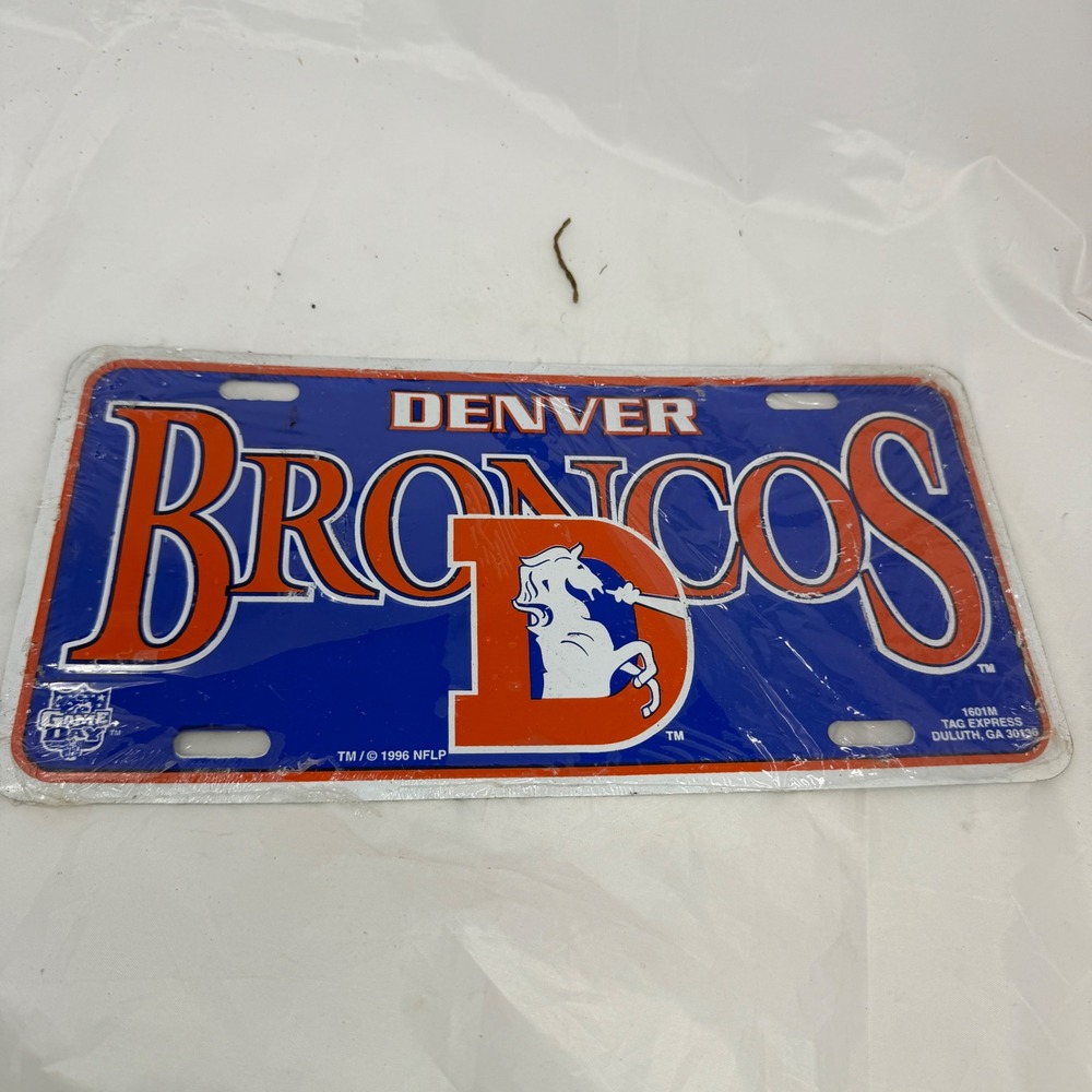 Vintage 1996 Denver Broncos NFL License Plate Tag Express 1601M Blue Orange Logo